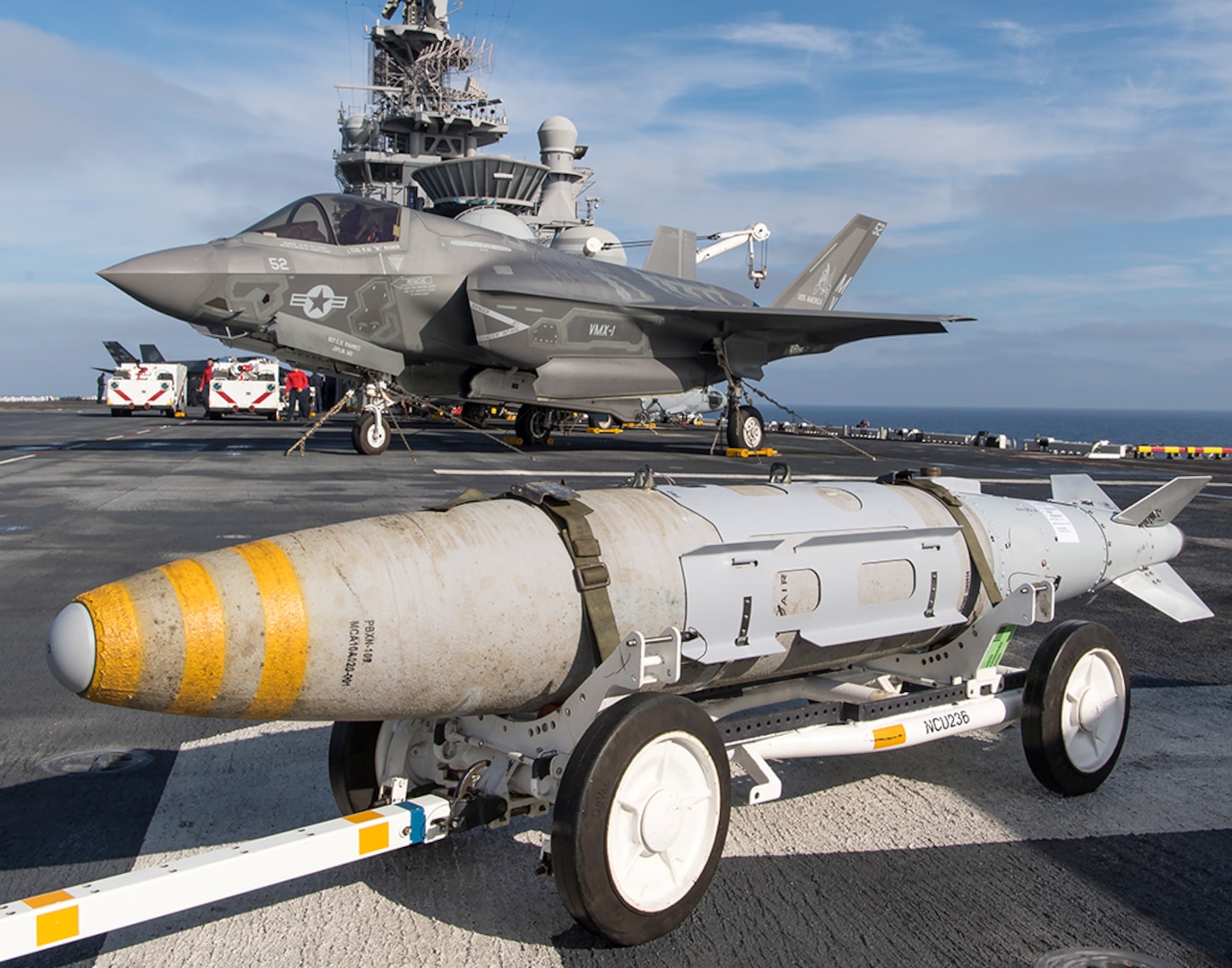 Ordnance is prepared for an F-35B Lightning II short takeoff/vertical landing (STOVL) aircraft on the amphibious assault ship USS America (LHA 6). This event marked the first live ordnance uploaded to the F-35B at sea, Nov. 5, 2016.  During the third and final F-35B developmental test phase (DT-III), the aircraft is undergoing envelope expansion via a series of launches and recoveries in various operating conditions such as high sea states and high winds. 