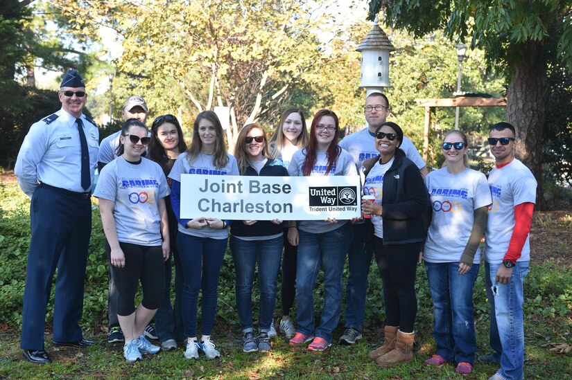 Col. Robert Lyman, Joint Base Charleston commander (left), thanks Airmen and civilians from JB Charleston for their volunteer efforts at the Park Circle Butterfly Garden in North Charleston, South Carolina, during Trident United Way’s Day of Caring Nov 18, 2016. Approximately 200 JB Charleston Airmen and civilians volunteered at 12 different locations in the local community. In total, the annual event brough in more than 5,000 volunteers from the tri-county area as part of Day of Caring 2016.