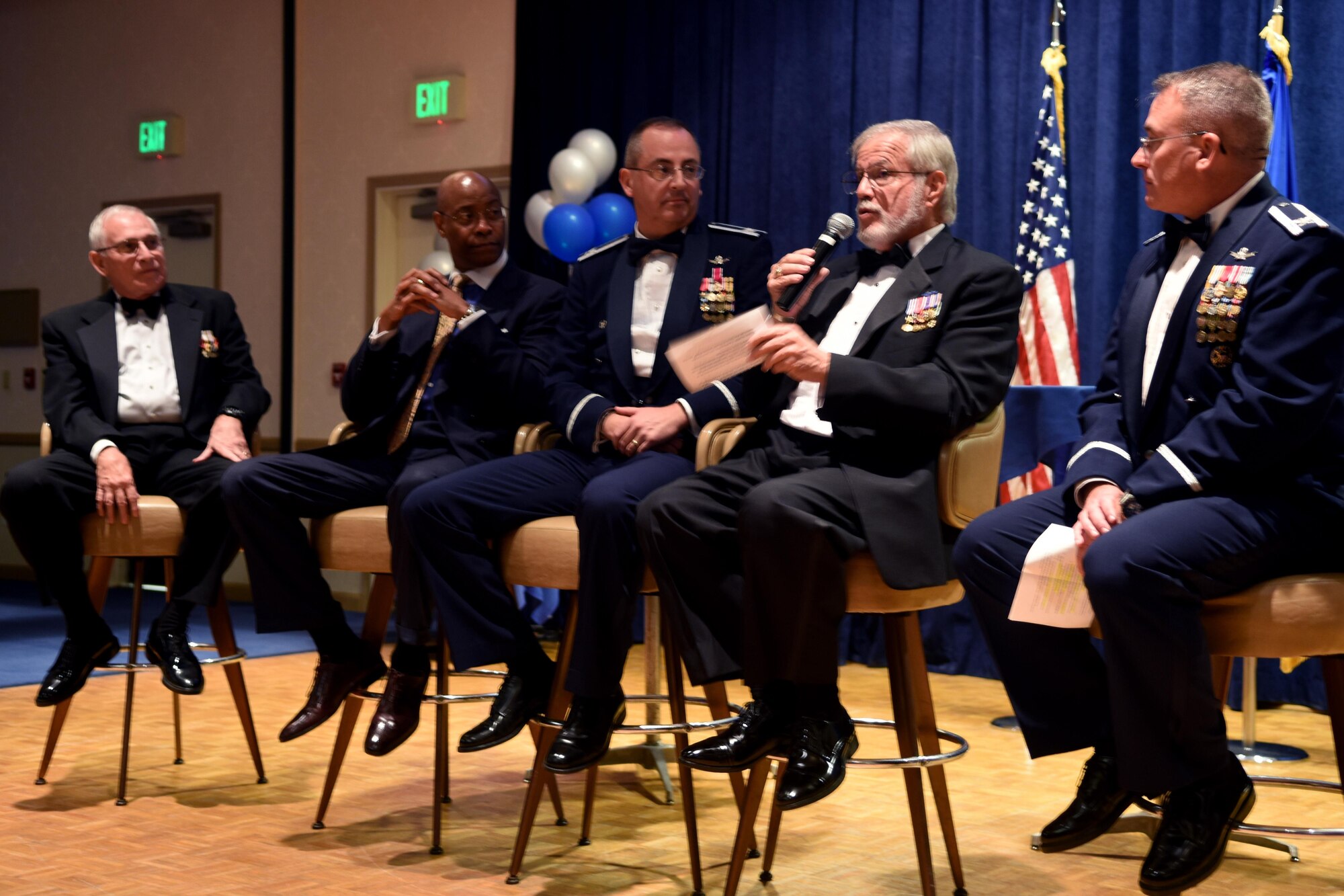 Col. J. Christopher Moss, 30th Space wing commander (far right) and former 30th Space Wing leaders, address patrons of the wing’s Silver Anniversary ball, Nov. 18, 2016, Vandenberg Air Force Base, Calif. Vandenberg recently celebrated the 30th Space Wing’s 25 years of existence with a week full of commemorative events, here, Nov. 14 through 19. (U.S. Air Force photo by Staff Sgt. Kaleb Mayfield) 
