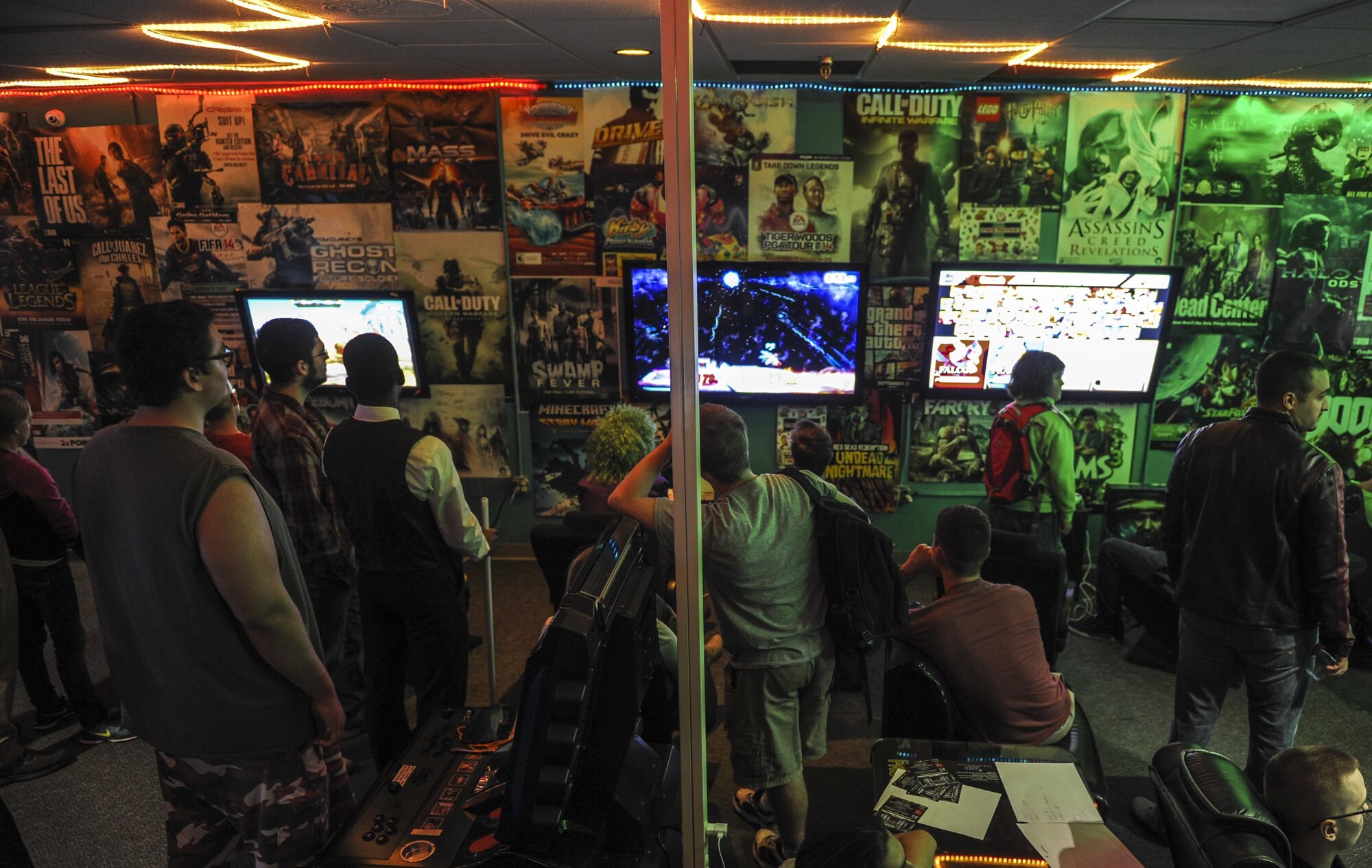 Air Commandos and their families participate in the video game tournament at the Landing Zone Community Centers’ Commando Con at Hurlburt Field, Fla., Nov. 19, 2016. Commando Con is based off of comic conventions where like-minded individuals amerce themselves in a fantasy world by dressing up as their favorite fictional characters. At this Con, Airmen also competed in various video game and card tournaments for prizes. (U.S. Air Force photo by Airman 1st Class Isaac O. Guest IV)