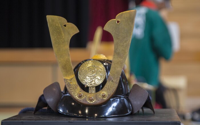 A samurai helmet sits to the side during the 27th annual Kuragake Festival and Samurai Parade in Iwakuni City, Japan, Nov. 20, 2016. The helmet is part of a traditional samurai armor U.S. Marines from Marine Corps Air Station Iwakuni donned before marching in the parade alongside local Japanese warriors. (U.S. Marine Corps photo by Sgt. Nicole Zurbrugg)