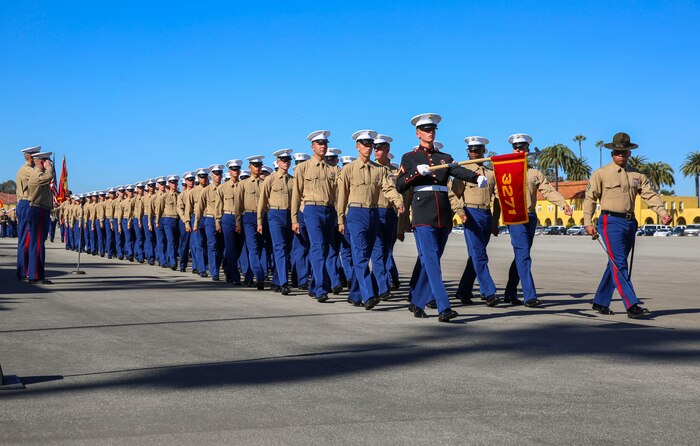 Marines from Mike Company, 3rd Recruit Training Battalion, march as a company for the last time on graduation day at Marine Corps Recruit Depot San Diego, Nov. 18. Graduation takes place at the completion of a 13-week transformation including training in drill, marksmanship, basic combat skills and Marine Corps customs and traditions. Annually, more than 17,000 males recruited from the Western Recruiting Region are trained at MCRD San Diego.