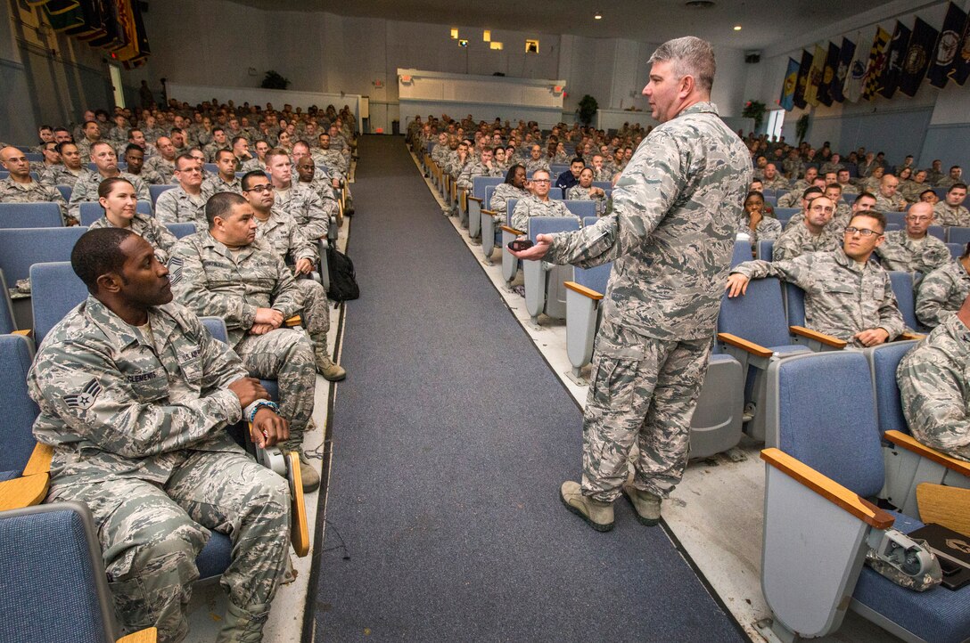 Lt. Col. George R. Sanderlin, Profession of Arms Center of Excellence, addresses New Jersey Air National Guard and 87th Air Base Wing Airmen along with Army Reserve Soldiers at the Timmerman Center, Joint Base McGuire-Dix-Lakehurst, N.J., Nov. 9, 2016. Sanderlin spoke about Professionalism: Enhancing human capital, which focuses on self-reflection as a means to better understand how military members can become better friends, parents, spouses, co-workers, and leaders. (U.S. Air National Guard photo by Master Sgt. Mark C. Olsen/Released)