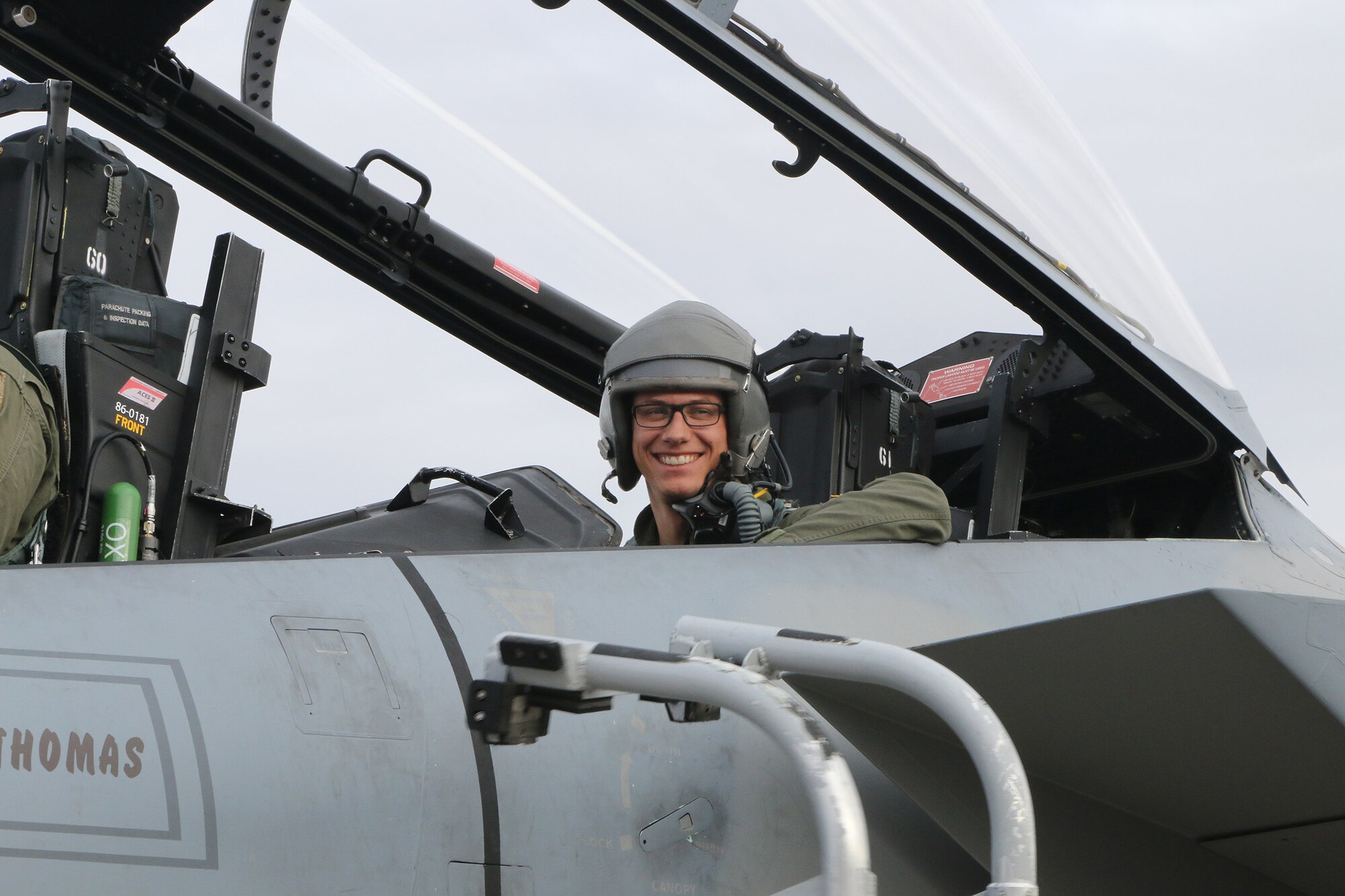 After surviving an IED blast in Afghanistan U.S. Marine Staff Sgt. Charlie Linville, who was suffered an amputation, PTSD and a lower spine injury sits aboard the F-15 Eagle at Kingsley Field in Klamath Falls, Oregon waiting to take-off, Nov. 14, 2016. Among his achievements following his recovery, Linville is the first combat injured veteran to summit Mt. Everest in May, the world’s highest peak. (U.S. Air National Guard photo by Tech. Sgt. Jefferson Thompson)