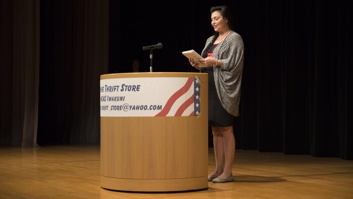 Julie Pace, a speech contestant, presents a speech at the 55th Annual Japanese and English Speech Contest at the Iwakuni Sinfonia in Iwakuni City, Japan, Nov. 13, 2016. Speech contestants were judged on their articulation, enunciation, and clear and concise speaking as well as their overall performance. (U.S. Marine Corps photo by Pfc. Gabriela Garcia-Herrera)