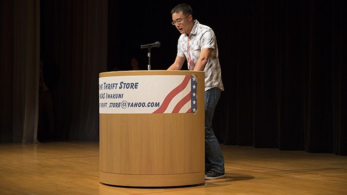 Kevin Barr, a contestant at the 55th Annual Japanese and English Speech Contest, delivers his speech in Japanese at Iwakuni Sinfonia in Iwakuni City, Japan, Nov. 13, 2016. Barr won 3rd place in the advanced Japanese division with his speech “Heiwa na sekai”. Japanese students delivered speeches in English and Americans in Japanese, while being critiqued on voice control, fluency and overall performance. The speech contest broke through language barriers and cultural differences, creating a stronger relationship between Japanese and Americans.  (U.S, Marine Corps photo by Pfc. Gabriela Garcia-Herrera)