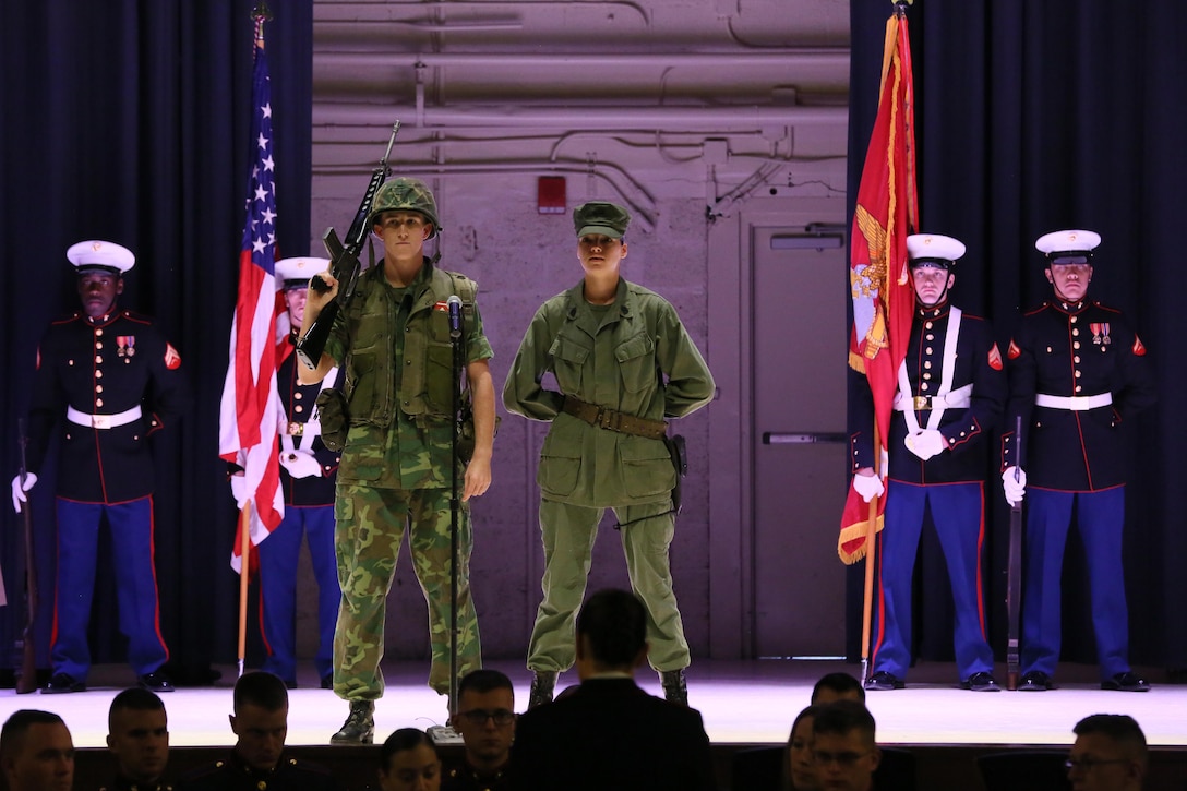 Pfc. Christian Taylor (left) and Pvt. Sierra Robbins represent Marines in the Vietnam War during the annual Historic Uniform Pageant aboard Marine Corps Air Station Cherry Point, N.C., Nov. 4, 2016. The pageant is held to honor the Marine Corps’ birthday and features Marines wearing uniforms from all major conflicts the Marine Corps has fought in. The pageant depicts the Corps’ long illustrious history throughout decades of warfighting. The pageant also included a traditional cake-cutting ceremony representing the passing of traditions from the eldest Marine to the youngest. (U.S. Marine Corps photo by Lance Cpl. Mackenzie Gibson/Released)