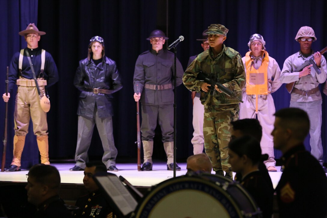 Lance Cpl. Jose Martinez represents a Marine in the 1980’s during the annual Historic Uniform Pageant aboard Marine Corps Air Station Cherry Point, N.C., Nov. 4, 2016. The pageant is held to honor the Marine Corps’ birthday and features Marines wearing uniforms from all major conflicts the Marine Corps has fought in. The pageant depicts the Corps’ long illustrious history throughout decades of warfighting. The pageant also included a traditional cake-cutting ceremony representing the passing of traditions from the eldest Marine to the youngest. (U.S. Marine Corps photo by Lance Cpl. Mackenzie Gibson/Released)