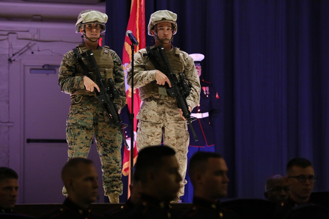 Cpl. Kayla Gilstrap (left) and Lance Cpl. Robert Rocco represent modern day Marines during the annual Historic Uniform Pageant aboard Marine Corps Air Station Cherry Point, N.C., Nov. 4, 2016. The pageant is held to honor the Marine Corps’ birthday and features Marines wearing uniforms from all major conflicts the Marine Corps has fought in. The pageant depicts the Corps’ long illustrious history throughout decades of warfighting. The pageant also included a traditional cake-cutting ceremony representing the passing of traditions from the eldest Marine to the youngest. (U.S. Marine Corps photo by Lance Cpl. Mackenzie Gibson/Released)