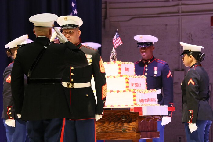 Col. Todd Ferry salutes Sgt. Maj. Benjamin Pangborn during the annual Historic Uniform Pageant aboard Marine Corps Air Station Cherry Point, N.C., Nov. 4, 2016. The pageant is held annually to honor the Marine Corps’ birthday, and features Marines wearing uniforms from all major conflicts the Marine Corps has fought in. The pageant also included a traditional cake-cutting ceremony, where the first slice of cake is given to the oldest Marine present and passed to the youngest Marine to symbolize the experience and youthful spirit that are hallmarks of the Marine Corps. Ferry is the commanding officer and Pangborn is the sergeant major for MCAS Cherry Point. (U.S. Marine Corps photo by Lance Cpl. Mackenzie Gibson/Released)