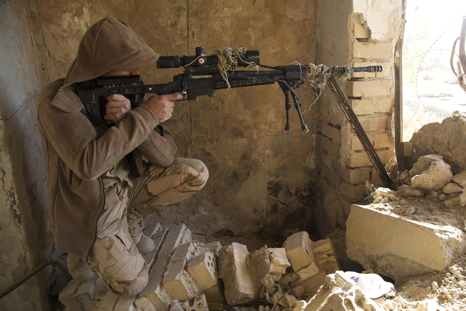 161116-A-JA380-034
An Iraqi soldier in a firing position during stalking training at Camp Taji, Iraq, Nov. 16, 2016. This training is critical to enabling the Iraqi security forces to counter Da’esh as they work to regain territory from the terrorist group. (U.S. Army photo by Spc. Craig Jensen)