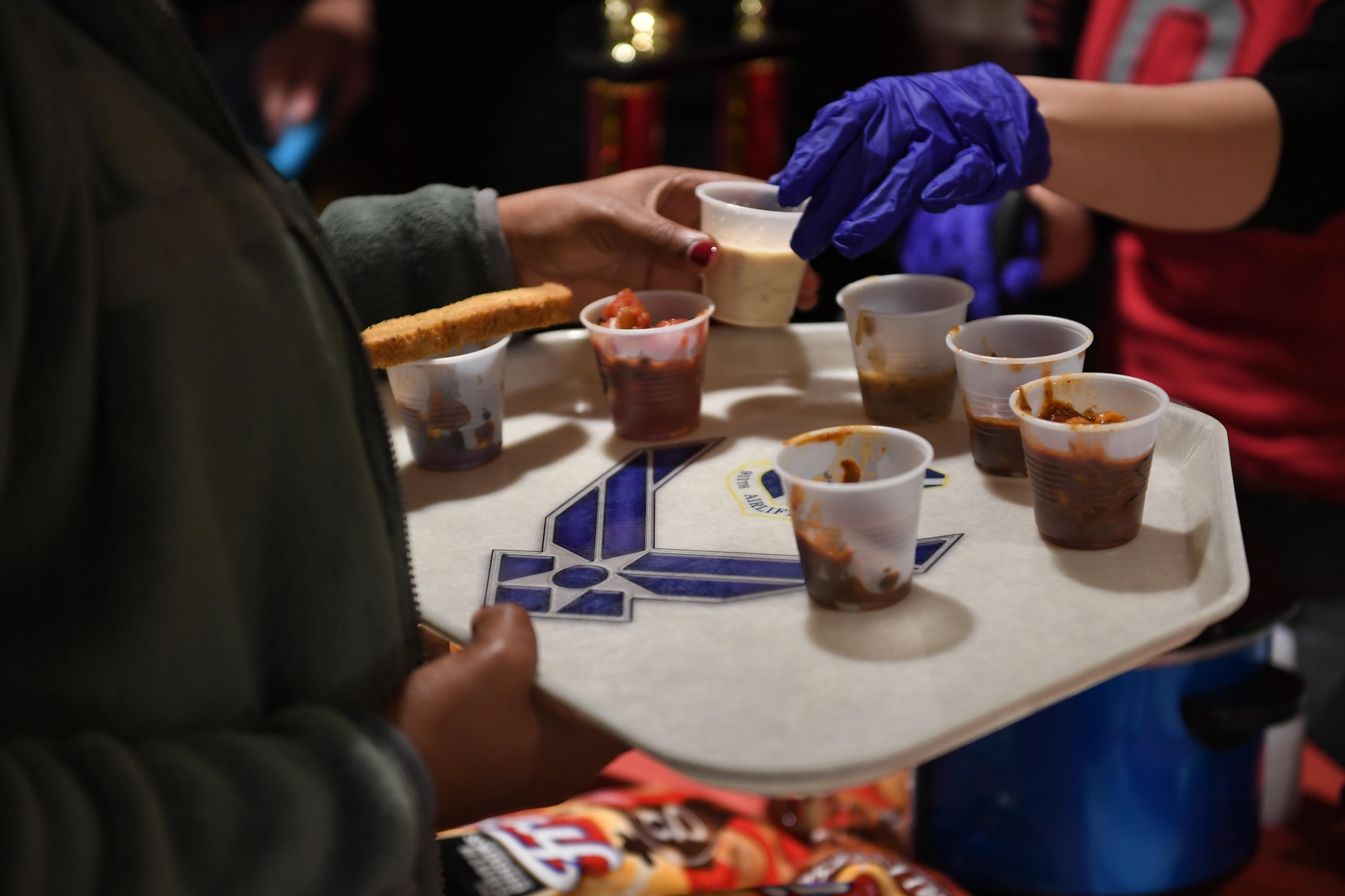 Members of the 911th Airlift Wing participate in a chili and soup cook-of held at the Pittsburgh International Airport Air Reserve Station, Pa, November 18, 2016. The event raised $286.25 for the Combined Federal Campaign and gave wing members an opportunity to speak with 12 non-profit charities. (U.S. Air Force photo by Airman 1st Class Beth Kobily)