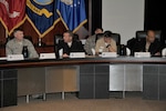 (From left:) DLA Director Air Force Lt. Gen. Andy Busch discusses agenda items with Vice Adm. Dixon Smith, Rear Adm. Jonathan Yuen and DLA Logistics Operations Director Rear Adm. Vince Griffith at the 2016 Navy/DLA Day.