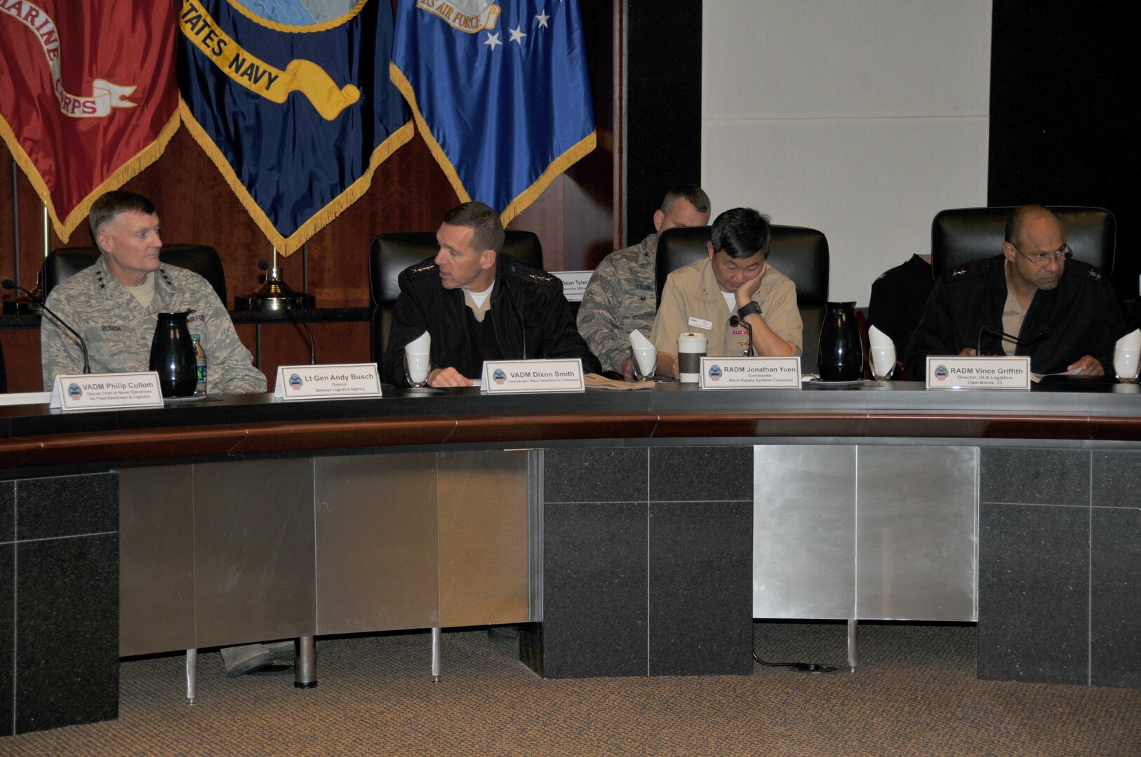 (From left:) DLA Director Air Force Lt. Gen. Andy Busch discusses agenda items with Vice Adm. Dixon Smith, Rear Adm. Jonathan Yuen and DLA Logistics Operations Director Rear Adm. Vince Griffith at the 2016 Navy/DLA Day.