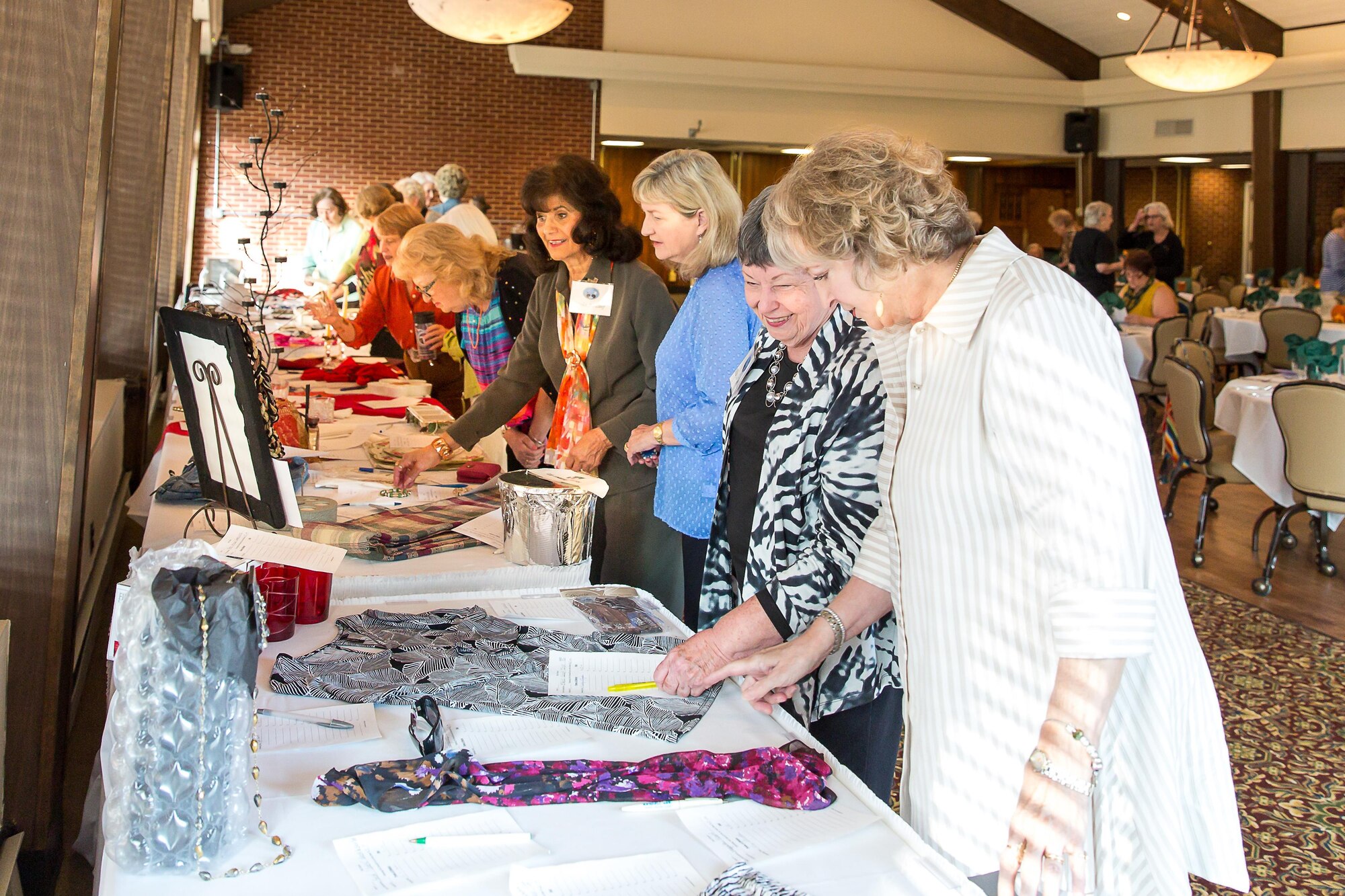 AEDC Woman’s Club meeting participants view Secret Shopper Items at the Nov. 3 meeting. Pictured left to right are Anne-Marie Pender, Sande Hayes, Violet Nauseef, Shirley Clark, Wanda Gobbell and Susie Schulz. (Courtesy photo)