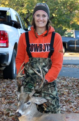 Jennifer Shultz with the buck she bagged during the disabled sportsman hunt at Oologah Lake. The annual hunt is sponsored by the Oklahoma Department of Wildlife Conservation.