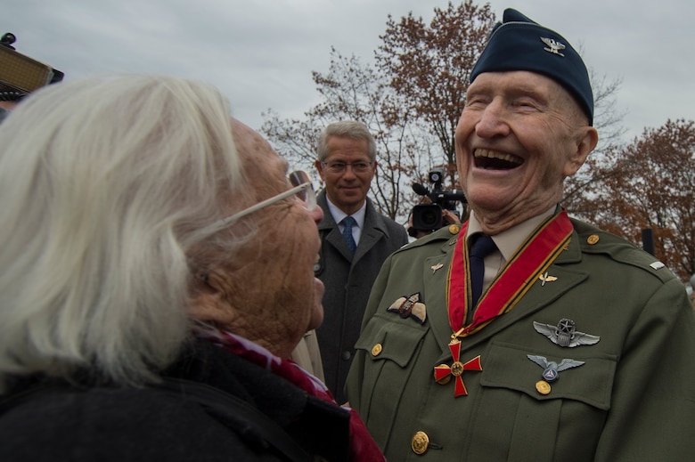 Retired U.S. Air Force Col. Gail Halvorsen, a C-52 Skymaster pilot also known as the Candy Bomber, visits with Gisela Rainare, a former civilian employee at the former Frankfurt an Main Air Base, Germany,  before the reopening ceremony of the Berlin Airlift Memorial outside Frankfurt International Airport, Germany, Nov. 22, 2016. Both Halvorsen and Rainare worked as part of the Berlin Airlift, also known as Operation Vittles, which delivered more than two million tons of food to the blockaded citizens of West Berlin between June 1948 and September 1949. (U.S. Air Force photo by Staff Sgt. Joe W. McFadden)