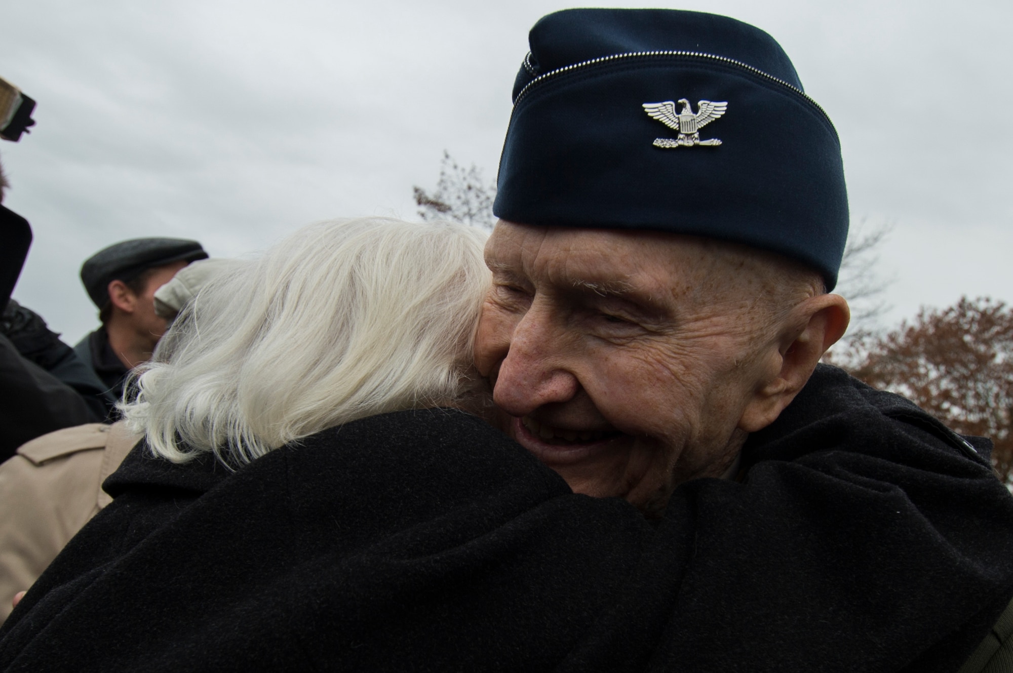 Retired U.S. Air Force Col. Gail Halvorsen, a C-52 Skymaster pilot also known as the Candy Bomber, hugs Gisela Rainare, a former civilian employee at the former Frankfurt an Main Air Base, Germany,  before the reopening ceremony of the Berlin Airlift Memorial outside Frankfurt International Airport, Germany, Nov. 22, 2016. Both Halvorsen and Rainare worked as part of the Berlin Airlift, also known as Operation Vittles, which delivered more than two million tons of food to the blockaded citizens of West Berlin between June 1948 and September 1949. (U.S. Air Force photo by Staff Sgt. Joe W. McFadden)
