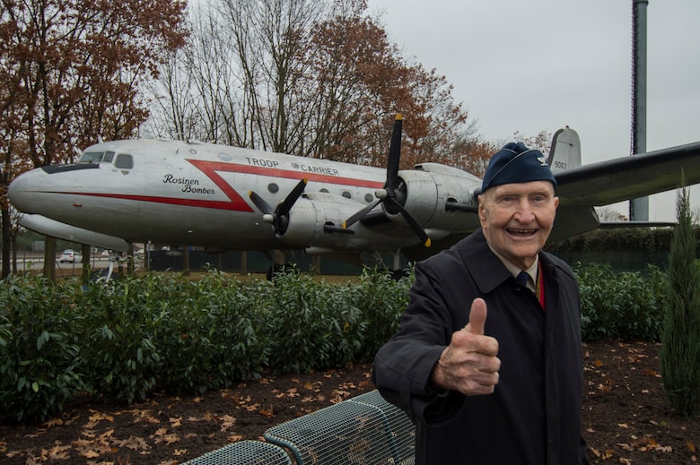 Retired U.S. Air Force Col. Gail Halvorsen, a C-52 Skymaster pilot also known as the Candy Bomber, gives a thumbs up gesture after the reopening ceremony of the Berlin Airlift Memorial outside Frankfurt International Airport, Germany, Nov. 22, 2016. Halvorsen and his fellow pilots dropped 23 tons of candy with makeshift parachutes from his C-54 as part of the Berlin Airlift, which delivered more than two million tons of food to the blockaded citizens of West Berlin between June 1948 and September 1949. (U.S. Air Force photo by Staff Sgt. Joe W. McFadden)
