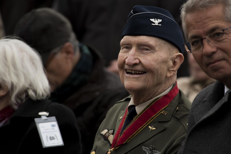 Retired U.S. Air Force Col. Gail Halvorsen, a C-52 Skymaster pilot also known as the Candy Bomber, smiles before the reopening ceremony of the Berlin Airlift Memorial outside Frankfurt International Airport, Germany, Nov. 22, 2016. Halvorsen and his fellow pilots dropped 23 tons of candy with makeshift parachutes from his C-54 as part of the Berlin Airlift, which delivered more than two million tons of food to the blockaded citizens of West Berlin between June 1948 and September 1949. (U.S. Air Force photo by Staff Sgt. Joe W. McFadden)