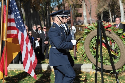 While most people celebrate Veteran’s Day weekend with families and friends, more than a hundred people came to Fort Douglas Military Cemetery November 13 to honor the 41 German prisoners of war (POW) who are buried here from both World Wars I and II.  
The German Day of Remembrance has been celebrated every year at Fort Douglas since 1977.  The event began with the presentation of colors by the Air Force ROTC Color Guard, University of Utah, followed with the German and American national anthems.