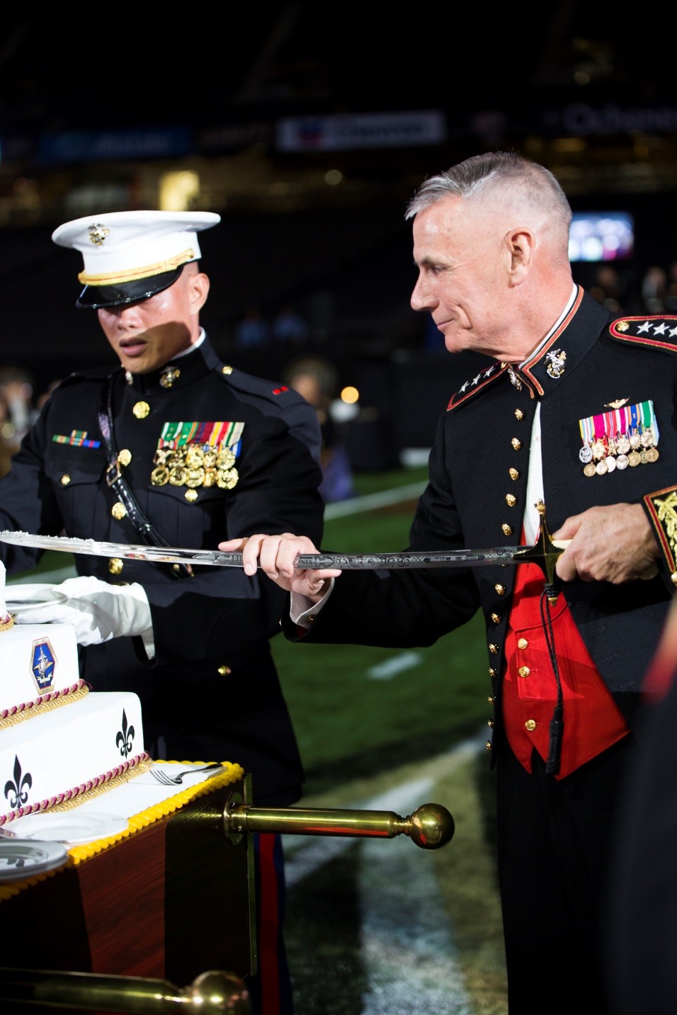 Lt. Gen. Rex C. McMillian, commander of Marine Forces Reserve and Marine Forces North cuts the cake during the MARFORRES birthday ball at the Mercedes-Benz Superdome, Nov. 19, 2016. Each year, a ball is hosted to celebrate the birthday of the Corps and to remember Marines who have given the ultimate sacrifice. Since its establishment in 1775, the Marine Corps has fought and won our nation’s battles. (U.S. Marine Corps photo by Cpl. Melissa Martens/ Released) 