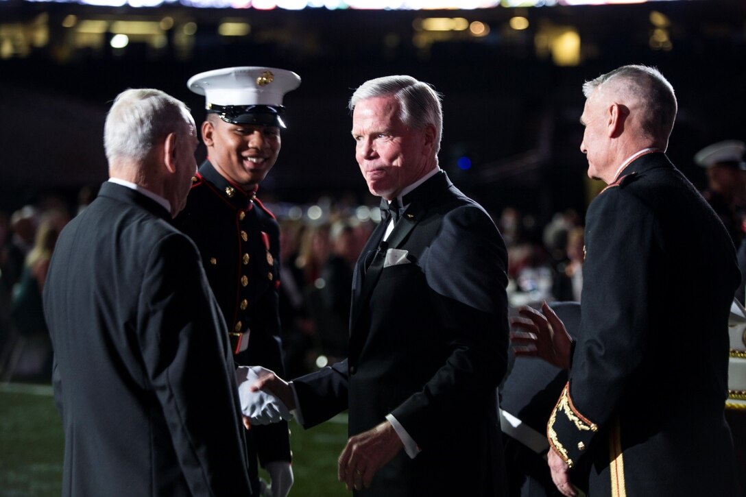 Retired Gen. James F. Amos, 35th Commandant of the Marine Corps, interacts with members of the cake cutting detail during the Marine Forces Reserve birthday ball at the Mercedes-Benz Superdome, Nov. 19, 2016. Each year, a ball is hosted to celebrate the birthday of the Corps and to remember Marines who have given the ultimate sacrifice. Since its establishment in 1775, the Marine Corps has fought and won our nation’s battles. (U.S. Marine Corps photo by Cpl. Melissa Martens/ Released)