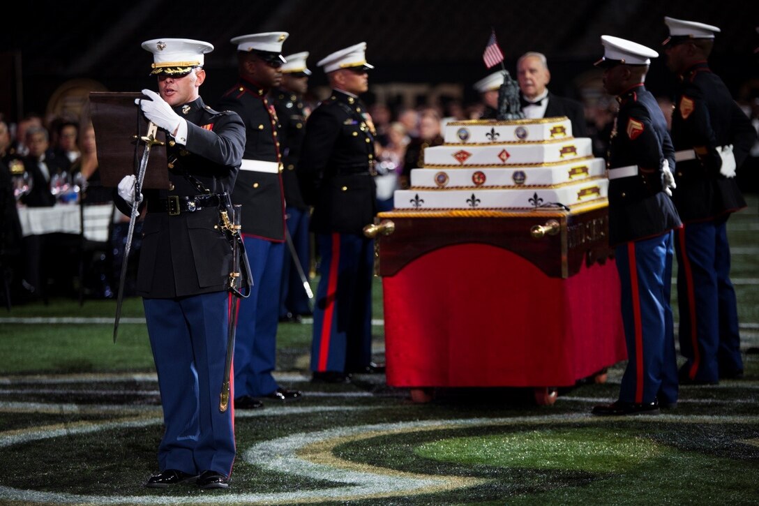 Maj. Anthony K. Alejandre, adjutant, Marine Forces Reserve, reads the birthday message from Gen. John A. Lejeune, 13th Commandant of the Marine Corps, during the MARFORRES birthday ball at the Mercedes- Benz Superdome, Nov. 19, 2016. Each year, a ball is hosted to celebrate the birthday of the Corps and to remember Marines who have given the ultimate sacrifice. Since its establishment in 1775, the Marine Corps has fought and won our nation’s battles. (U.S. Marine Corps photo by Cpl. Melissa Martens/ Released)