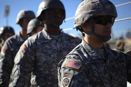 U.S. Army 1st Lt. Rodolfo Saez, of the 982nd Combat Camera Company, stands with fellow U.S. Army soldiers during aircraft drill refresher exercises, at March Air Reserve Base, Riverside Cali., November 18, 2016.  Exercise TOPHAM is a multinational Airborne exercise hosted by the 426th Civil Affairs Battalion at March Air Reserve Base and Camp Pendleton, Calif., with field exercises on Civil Military Operations Center and Civil Information Management key collective tasks. (U.S. Army photo by Sgt. Phillip McTaggart/Released)