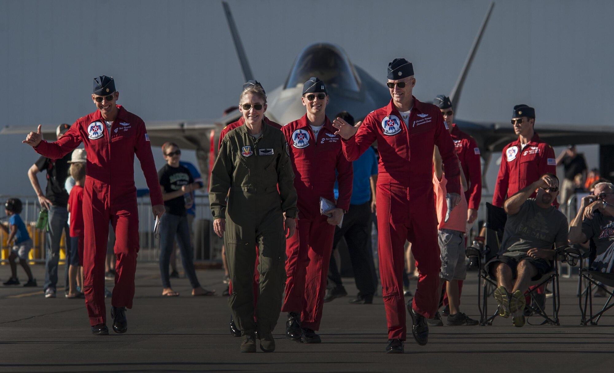 Brig. Gen. Jeannie Levitt, 57th Wing commander, walks with the U.S. Air Force Thunderbirds Air Demonstration Squadron pilots prior to flying with them during the Aviation Nation air show on Nellis Air Force Base, Nev., Nov. 11, 2016. Levitt became the first female USAF fighter pilot in 1993 and was the first woman to command a USAF combat fighter wing. (U.S. Air Force photo by Airman 1st Class Kevin Tanenbaum/Released)