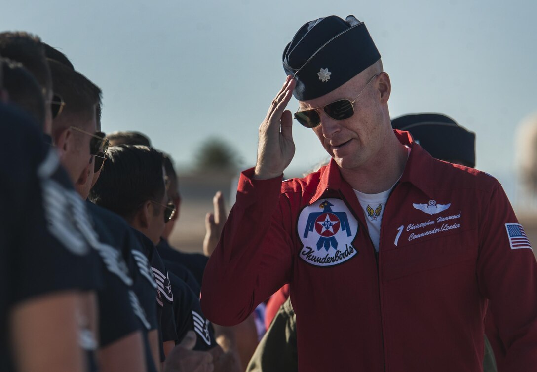 Lt. Col. Christopher Hammond, U.S. Air Force Air Demonstration Squadron commander, salutes Thunderbird crew chiefs before take-off during the Aviation Nation air show on Nellis Air Force Base, Nev. Nov., 11, 2016. Before joining the team, Hammond was the director of operations at the 16th Weapons Squadron, Nellis AFB, Nev. Hammond has logged more than 2,500 flight hours, with more than 400 hours of combat experience in the F-16. (U.S. Air Force photo by Airman 1st Class Kevin Tanenbaum/Released)