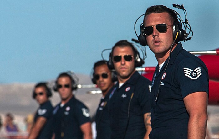 U.S. Air Force Thunderbird Air Demonstration Squadron crew chiefs line up during their demonstration at Aviation Nation on Nellis Air Force Base, Nev., Nov. 11, 2016. Since 1953, the Thunderbirds have performed for millions of people across the United States, spreading the word about the Air Force and its precision, skill and decisive combat power. (U.S. Air Force photo by Airman 1st Class Kevin Tanenbaum/Released)