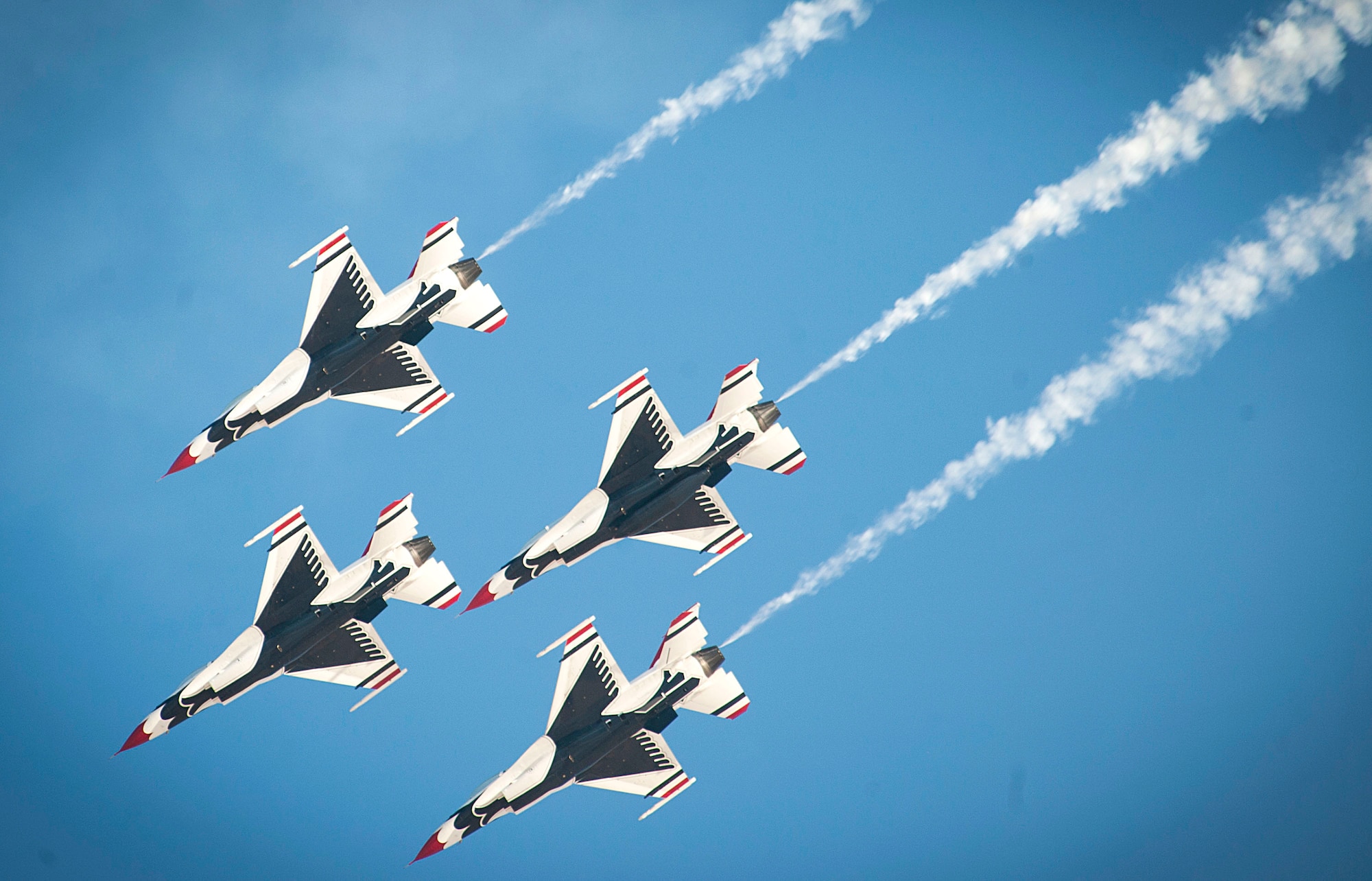 Members of the U.S. Air Force Thunderbirds Air Demonstration Squadron fly in an aerial performance during the Aviation Nation air show on Nellis Air Force Base, Nev., Nov. 11, 2016. The Thunderbirds’ performance at Aviation Nation marked their final show of the 2016 season. (U.S. Air Force photo by Airman 1st Class Kevin Tanenbaum/Released)