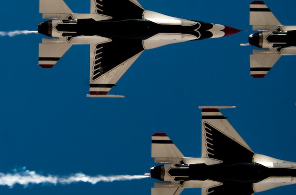 U.S. Air Force Thunderbird Air Demonstration Squadron  aircraft fly in a close-air formation during Aviation Nation on Nellis Air Force Base, Nev., Nov. 13, 2016. The Thunderbirds are the Air Force’s demonstration team that showcase the decisive combat power, precision and professionalism of the aviators, maintenance and support Airmen. (U.S. Air Force photo by Airman 1st Class Kevin Tanenbaum/Released)