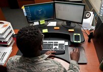 Airman 1st Class Malik Howard, 5th Maintenance Group maintenance operations flight data integrity team member, manages discrepancy information at Minot Air Force Base, N.D., Nov. 15, 2016. The 5 MXG maintenance operations flight Airmen use discrepancy data to guide squadrons how to efficiently document maintenance. (U.S. Air Force photo/Airman 1st Class Jonathan McElderry)