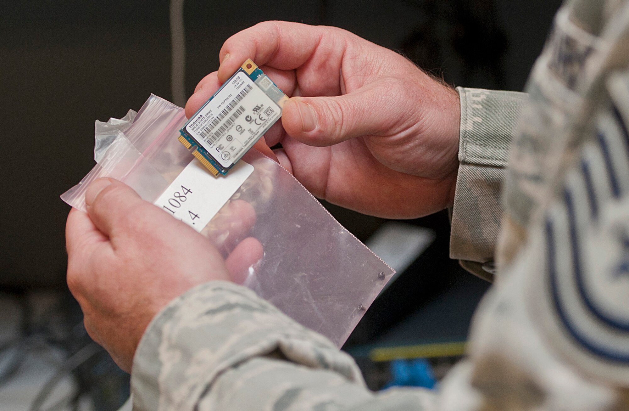 An Airman with the 5th Maintenance Group maintenance operations flight technical order distribution office checks a serial number at Minot Air Force Base, N.D., Nov. 15, 2016. Members of the distribution office track all maintenance operations flight equipment used for various jobs. (U.S. Air Force photo/Airman 1st Class Jonathan McElderry)