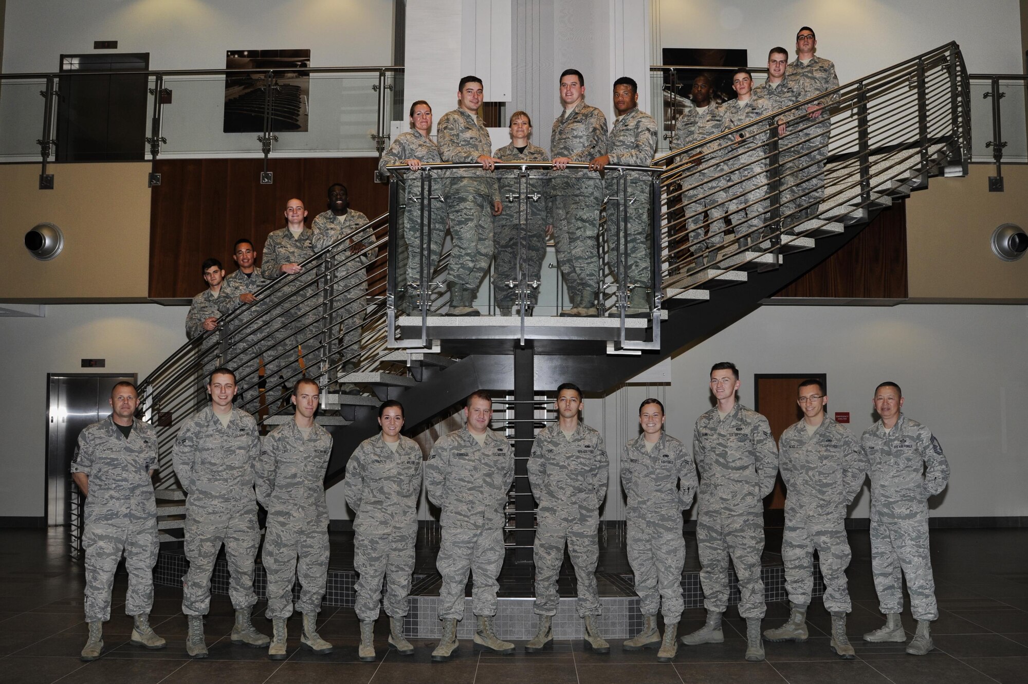 First Term Airman Center class 16-21, poses for a photo after graduating from the five-day course at Barksdale Air Force Base, La., Nov. 18, 2016. FTAC teaches new Airmen what resources are available to them and helps them start their new careers on the right foot. (U.S. Air Force photo/Staff Sgt. Joseph A. Pagan)