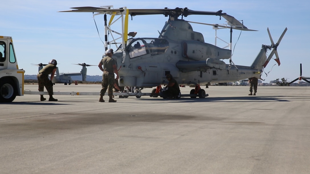 An AH-1Z Viper with Marine Light Attack Helicopter Squadron (HMLA) 267 is prepared to be transported on a C-17 Globemaster III aboard Marine Corps Air Station Miramar, Calif., Nov. 10. HMLA-267 deployed to MCAS Futenma, Okinawa, Japan, in November. (U.S. Marine Corps photo by Pfc. Liah Kitchen/Released)