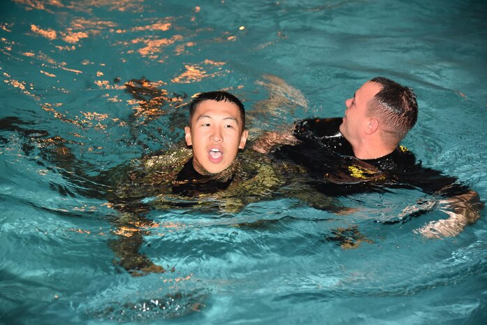 More 42 Soldiers assigned to A Co. 225th Brigade Support Battalion, 2nd Infantry Brigade Combat Team, 25th Infantry Division, and three Marines Water Survival Instructors, assigned to 3rd Marines Corps Regiment, took part in a water survival class Nov. 16, 2016, at Richardson Pool on Schofield Barracks. The training was designed to provide Soldiers with water survival techniques to overcome any open water fear.