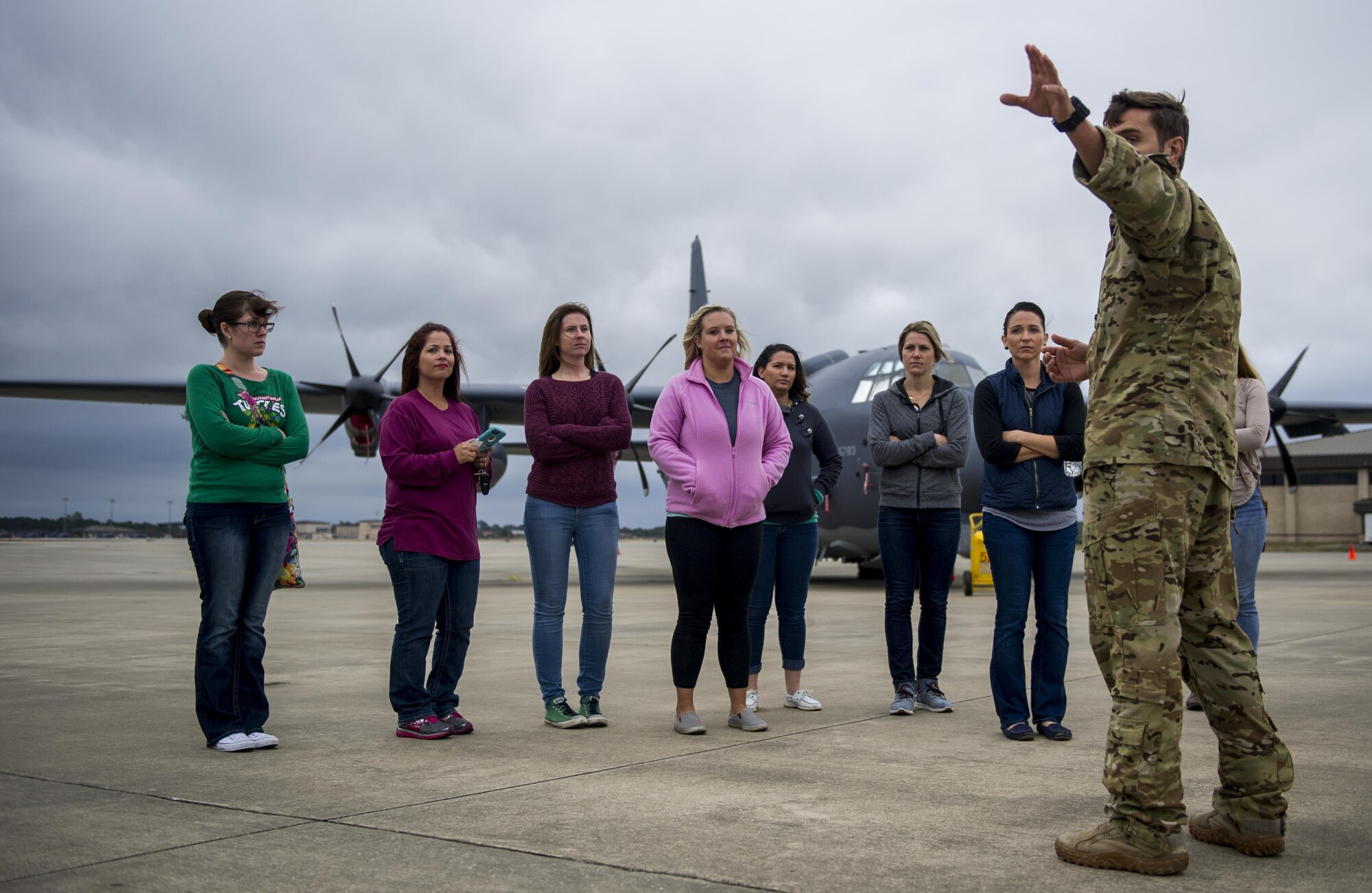 Spouses of Air Commandos receive a brief during a Spouses Flight tour at Hurlburt Field, Fla., Nov. 19, 2016. Spouses had the opportunity to fly in different aircraft including the AC130-J Ghostrider, CV-22 Osprey, AC-130U Spooky and U-28A in order to develop a better understanding of the 1st Special Operations Wing mission. (U.S. Air Force photo by Airman 1st Class Isaac O. Guest IV)