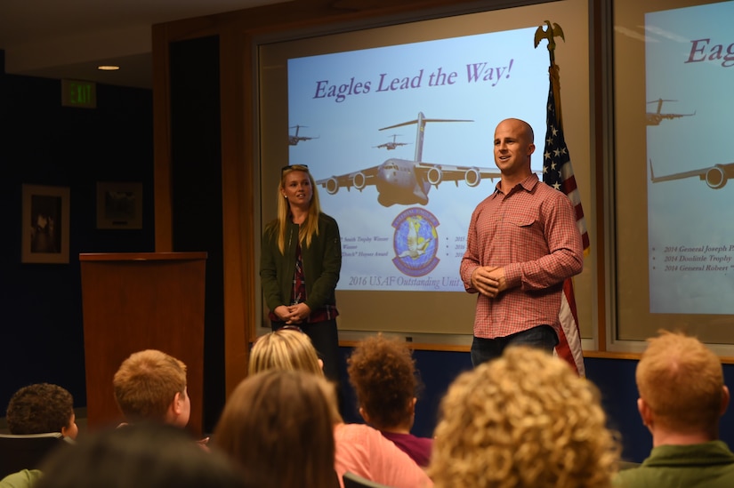 Brett Gardner, New York Yankees outfielder, right, and his wife, Jessica, left, speak with the members of the 15th Airlift Squadron Nov. 21, 2016. Gardner visited Joint Base Charleston to boost morale and offer thanks to military men and women who serve. Gardner and his wife toured a C-17 Globemaster III and provided lunch for the squadron.
 
