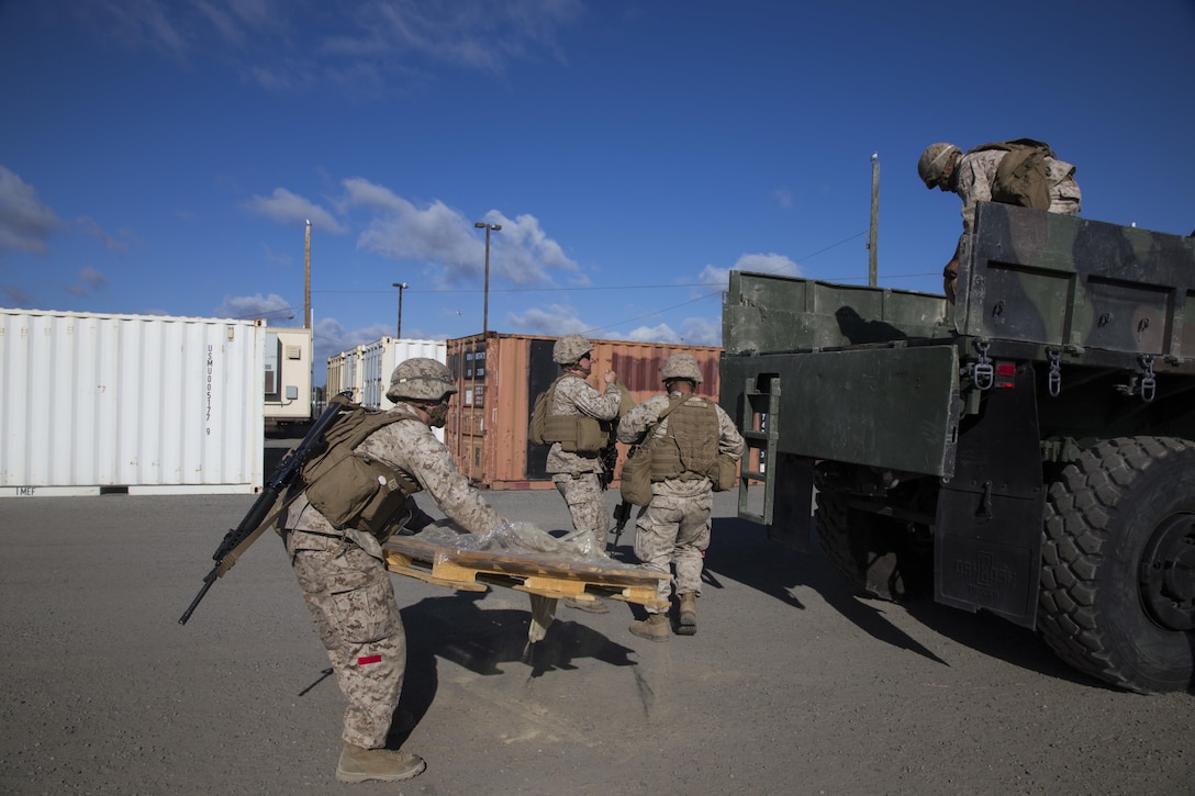 CAMP PENDLETON, Calif., (September 13, 2016) – Marines and Sailors with Combat Logistics Detachment 113, Combat Logistics Battalion 11, 11th Marine Expeditionary Unit, load pallets of food for a Foreign Humanitarian Assistance training mission during the Makin Island Amphibious Ready Group/11th MEU’s Certification Exercise Sept. 13, 2016. An FHA can include provision of food water, clothing, beds and bedding, temporary shelter and housing, medical material, medical and technical services, and essential service restoration CERTEX is the last exercise in the MEU’s six-month pre-deployment training cycle in which the ARG/MEU team will be tested then certified as deployable prior to their WestPac 16-2 deployment to the Western Pacific and Central commands’ areas of operations. (US Marine Corps photo by Cpl. April L. Price/Released)
