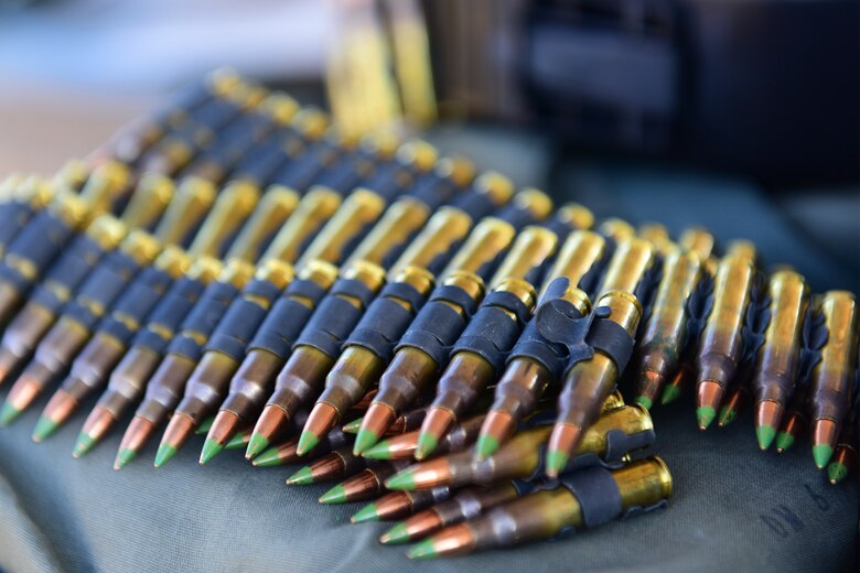 One hundred and fifty rounds of 5.56 ammunition for an M249 automatic rifle are prepared for practice fire at Fort Leonard Wood, Mo., Nov. 14, 2016. An Airman fires more than 300 rounds in total for their annual qualification training on the M249.