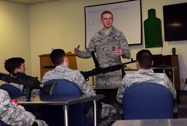 U.S. Air Force Senior Airman Christian Chesnet, a 509th Security Force Squadron combat arms instructor, teaches an M240B light machine gun annual qualification class at Whiteman Air Force Base, Mo., Nov. 9, 2016. The class was taught proper assembly, disassembly, loading, clearing and function checks.