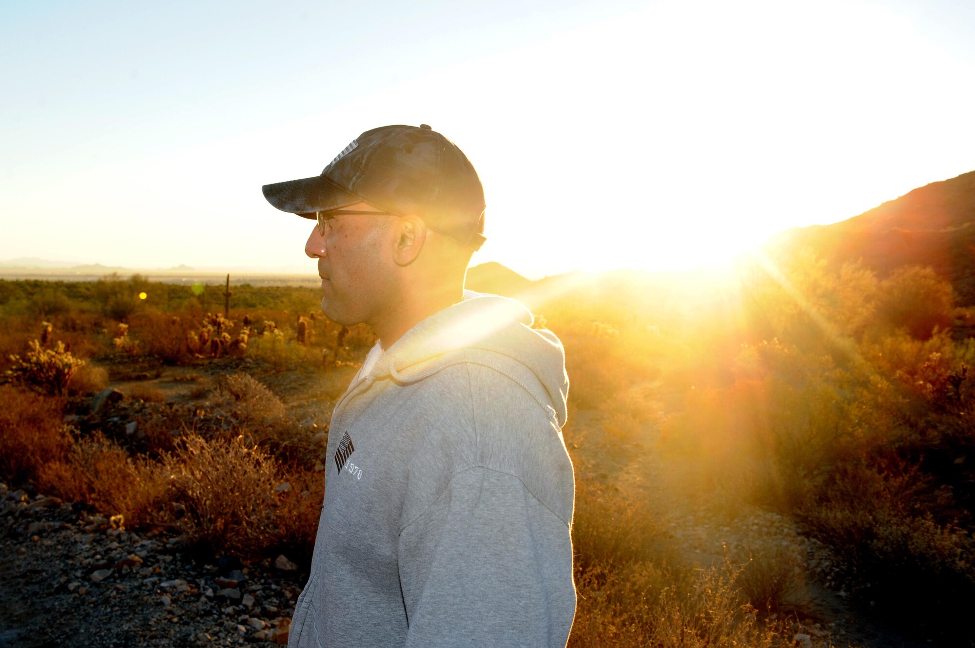 Master Sgt. Rudy Flores, 56th Maintenance Group first sergeant, hikes the Verrado trailhead Nov. 18, 2016 at the White Tank Mountains in Surprise, Ariz. The hike began at 6 a.m. and was about 3 miles. (U.S. Air Force photo by Airman 1st Class Pedro Mota)