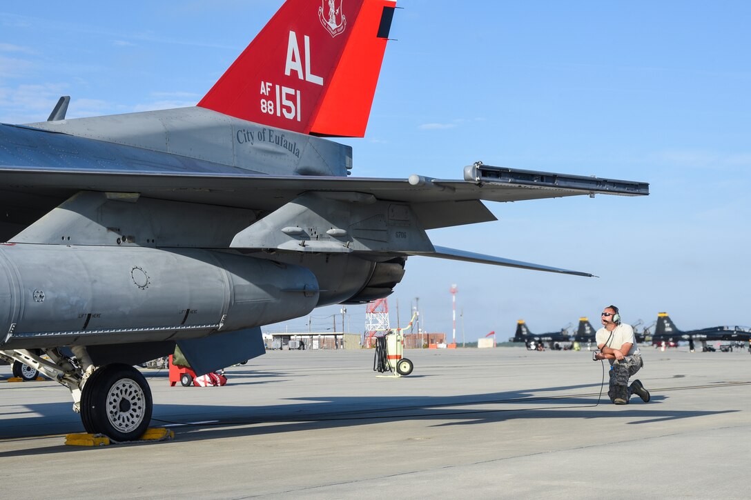 U.S. Air Force Tech. Sgt. Kyle Porter, a U.S. Air Force F-16 Fighting Falcon crew chief with the 187th Aircraft Maintenance Squadron, performs a routine check of flight controls before take-off Nov. 2, 2016, on the flightline at the Air Dominance Center at the 165th Airlift Wing in Savannah, Ga. (U.S. Air National Guard photo by Airman 1st Class Hayden Johnson)