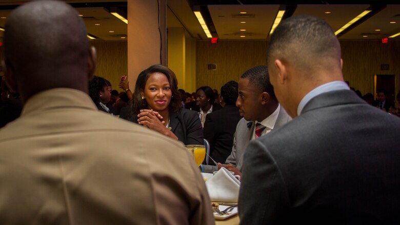 Bria Perkins speaks with Marine officers at a Morning Plenary during the Thurgood Marshall College Fund Leadership Institute at the Washington Hilton in Washington, D.C., Nov. 21, 2016. Marines host events, including workouts and workshops for the TMCF as a way to give back to the community and shape diverse young leaders. Hundreds of students from around the United States gather for the TMCF for the opportunity to learn from experienced men and women who rose from the same cultural backgrounds. Perkins is a student with Fayetteville State University in Fayetteville, North Carolina.