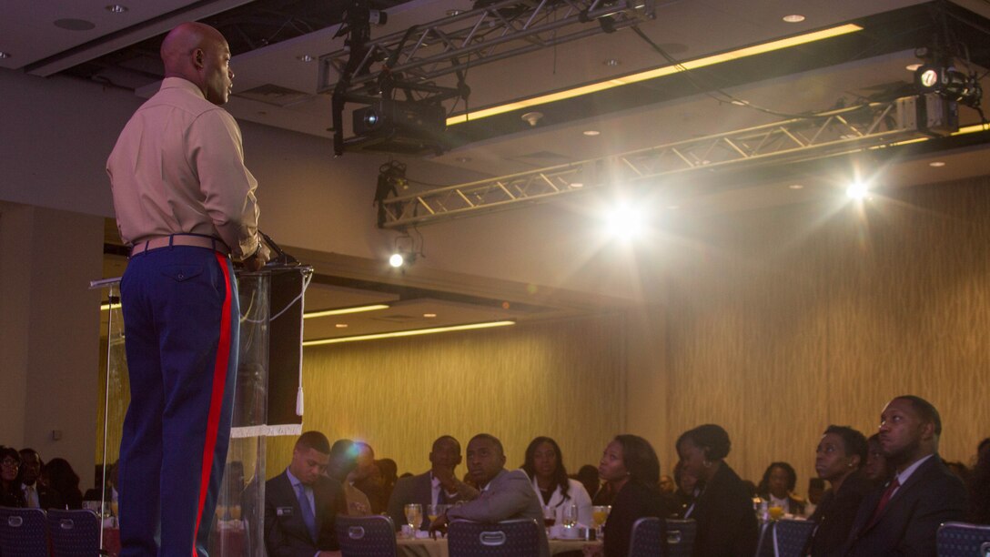 Colonel Anthony M. Henderson speaks to an audience at a morning plenary during the Thurgood Marshall College Fund Leadership Institute at the Washington Hilton, Nov. 21, 2016. Marines host events, including workouts and workshops for the TMCF as a way to give back to the community and shape diverse young leaders. Hundreds of students from around the United States gather for the TMCF for the opportunity to learn from experienced men and women who rose from the same cultural backgrounds.