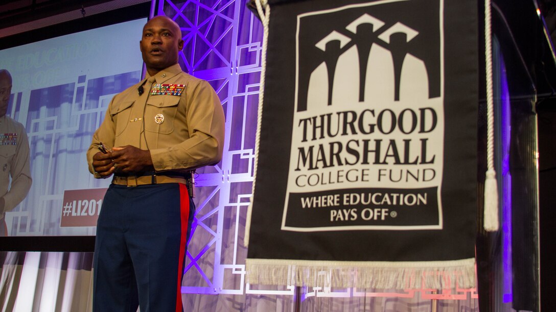Colonel Anthony M. Henderson speaks to an audience at a morning plenary during the Thurgood Marshall College Fund Leadership Institute at the Washington Hilton, Nov. 21, 2016. Marines host events, including workouts and workshops for the TMCF as a way to give back to the community and shape diverse young leaders. Hundreds of students from around the United States gather for the TMCF for the opportunity to learn from experienced men and women who rose from the same cultural backgrounds.