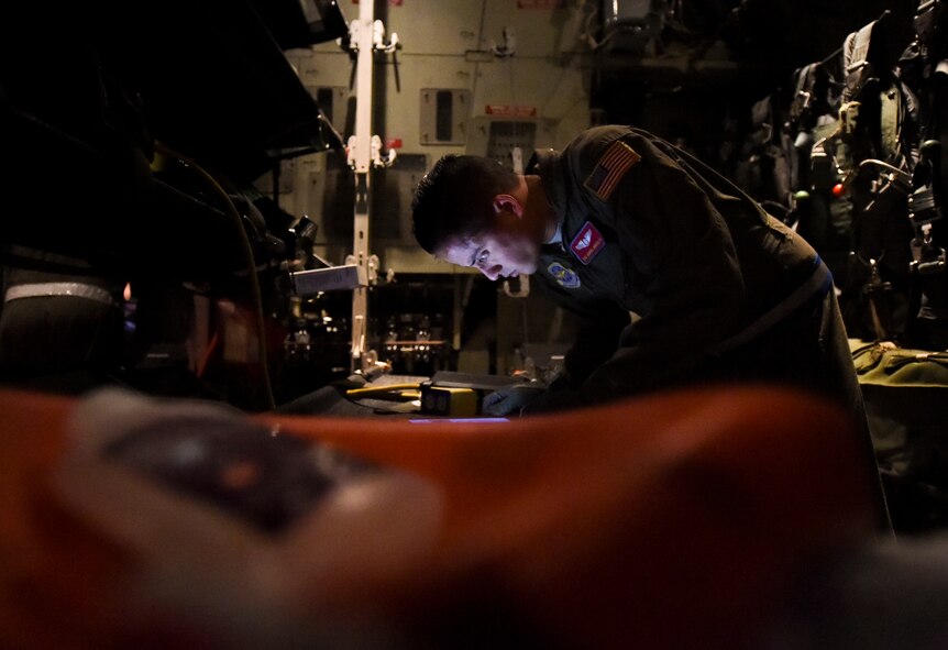 Tech. Sgt. Manuel Montaovo, 375th Aeromedical Evacuation Squadron air evacuation technician, conducts a pre-flight check of the unitron frequency converter during exercise Hurricane Greg, Nov. 8, 2016, at Little Rock Air Force Base, Ark. The unitron frequency converter allows medical equipment to be connected to the aircraft to assist injured personnel. (U.S. Air Force photo by Senior Airman Stephanie Serrano)